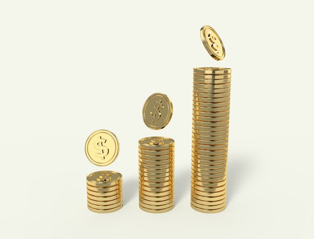 Three stacks of gold coins.