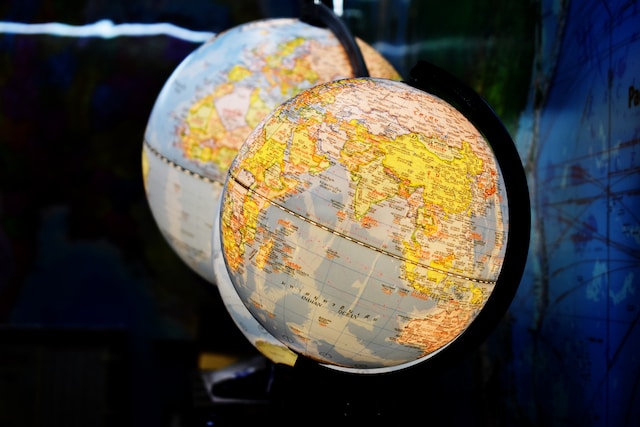 Two desk globe lamps.