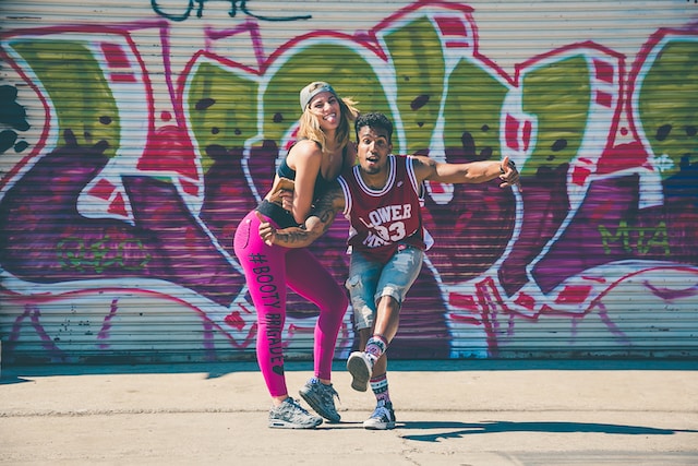 A man and woman dancing for a TikTok video.