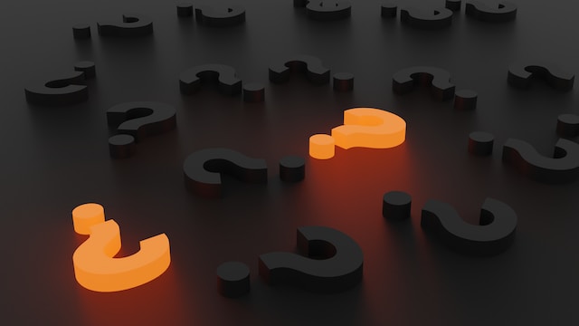 Black and orange question mark signs.