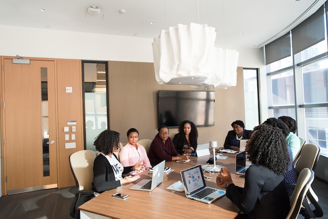 A team discussing ways to promote their business brand.