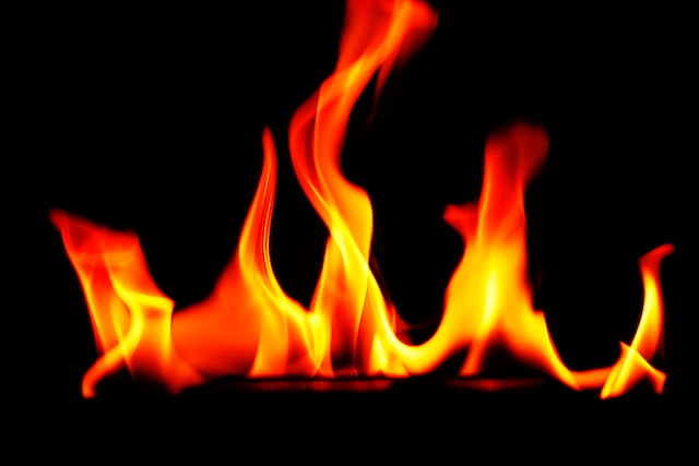 Orange flame with a black background.
