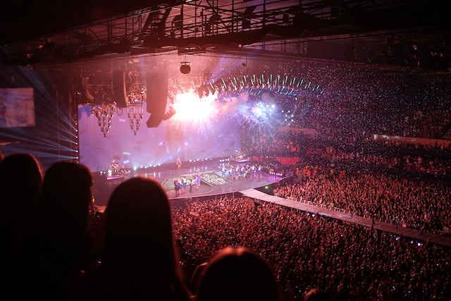 A massive audience inside a big stadium.