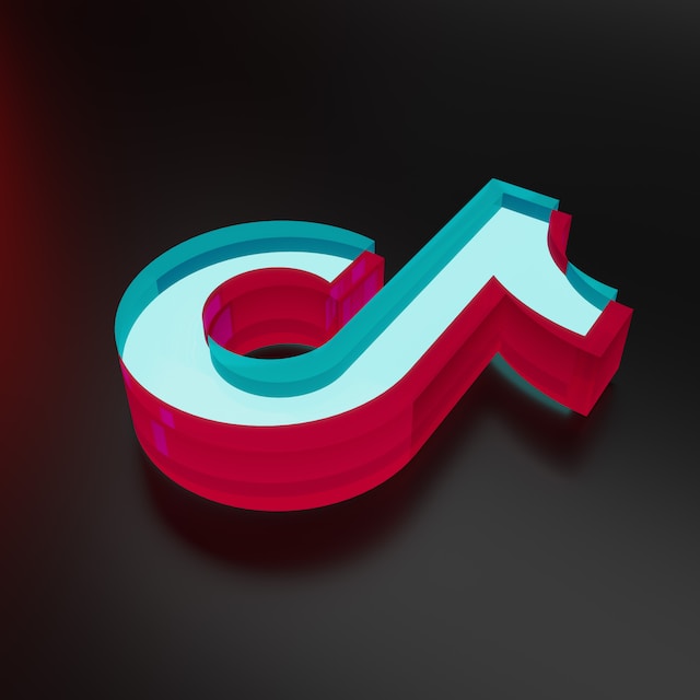 A 3D illustration of the TikTok logo on a black background.