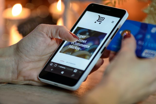 An image of a person doing some online shopping on their phone.
