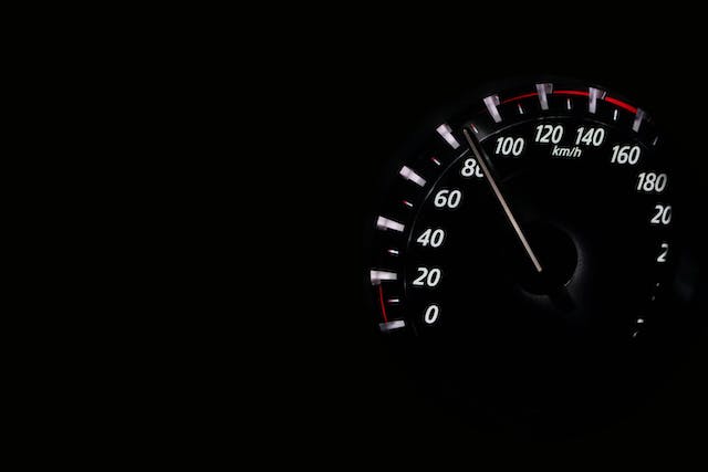 A close-up image of a speedometer.
