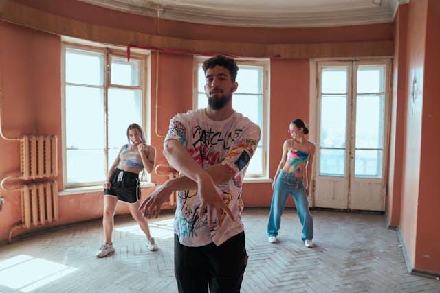 People dancing together for a video.