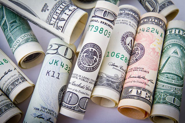 Several rolled up $20 bills.
