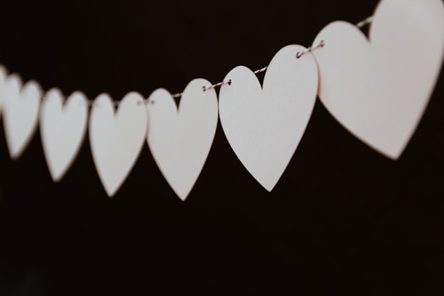 A string of white paper hearts.