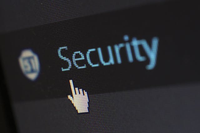 A computer screen displays the word “Security.”