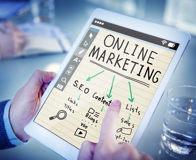 A person browses about online marketing on a tablet.
