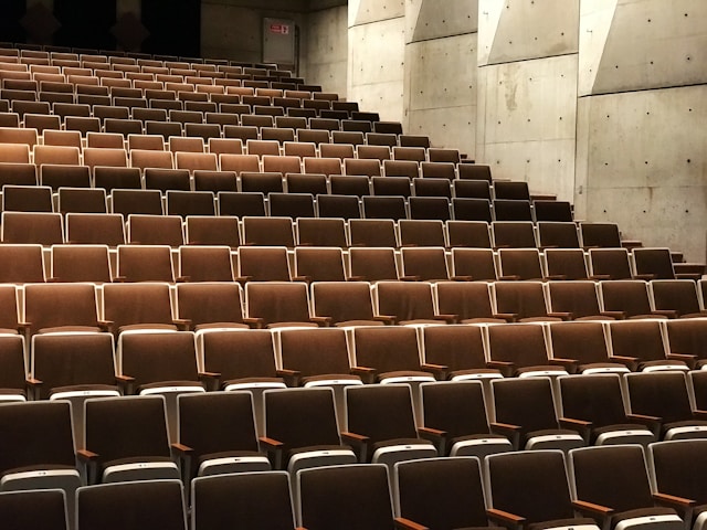 An auditorium with empty seats.