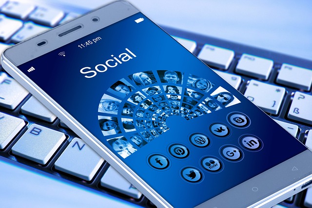 A mobile phone shows several media app icons and users on the screen.