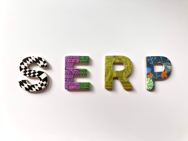 Colorful letter tiles spell the acronym “SERP.”
