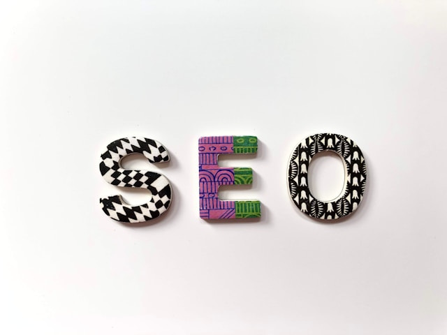 Big letter tiles spell the acronym “SEO.”