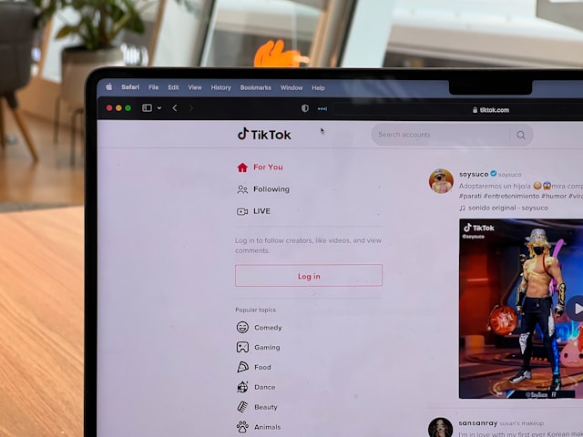 A computer screen displays the TikTok website on a browser.