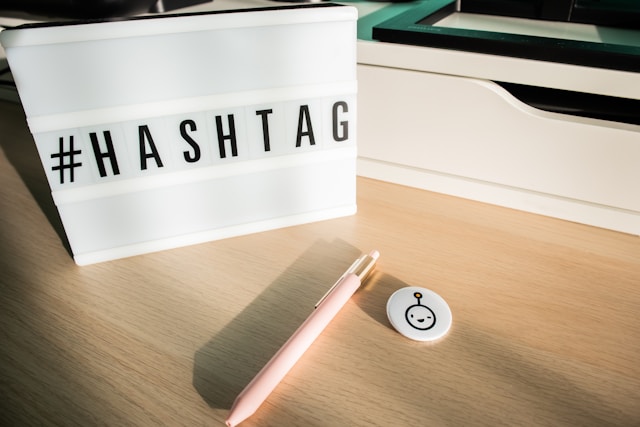 Letter tiles spell the word “#Hashtag.”